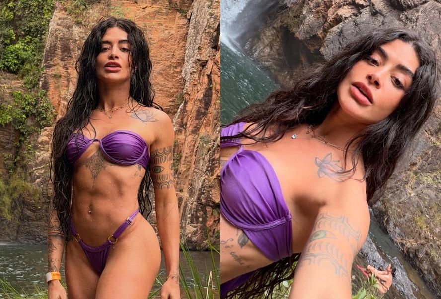 Em cachoeira, Aline Campos ostenta abdômen trincado e tatuagens que restaram após processo de remoção