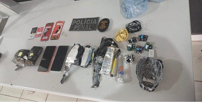 Policial penal é investigado por suspeita de facilitar entrada de 13 celulares e drogas em cadeia de MT